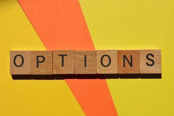 What vegan and gluten-free cooking options are available at campsite stores across the UK?